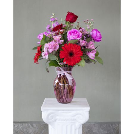Conroy's Flowers El Cajon El Cajon - Evoke serenity with our Blush Melody Garden. A harmonious ensemble of pink, red, and lavender blooms dances in perfect rhythm, creating a symphony of floral beauty. Perfect for adding an elegant touch to any space or occasion.
