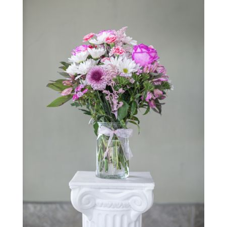 Conroy's Flowers El Cajon El Cajon - Vibrant hues of pink, lavender, and white blooms nestled in a glass vase celebrate the beauty and strength of motherhood. An expression of love and appreciation for the remarkable women who fill our lives with endless joy and warmth.