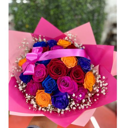 Conroy's Flowers El Cajon El Cajon - Embrace the beauty of diversity with our  Rose Bouquet in assorted colors. Each rose is elegantly wrapped in our most luxurious paper, and the bouquet is carefully decorated to create an everlasting impression on anyone fortunate enough to behold this stunning piece. For an even more grand and lavish gesture, consider upgrading to Deluxe, where you'll receive twice the size with an impressive 24 stems! This abundant bouquet is bound to make a statement, expressing your emotions in a truly extravagant way. Experience the joy of gifting and receiving this bountiful collection of roses.