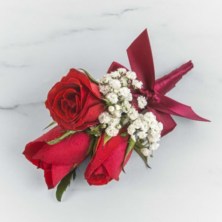 Morningside Florist Rancho Cordova - A classic red rose boutonniere that compliments any suit. Perfect for prom, formal or wedding events. Please inquire about other color options.
Leave note on order or call to specify ribbon color.
Unavailable for Delivery.