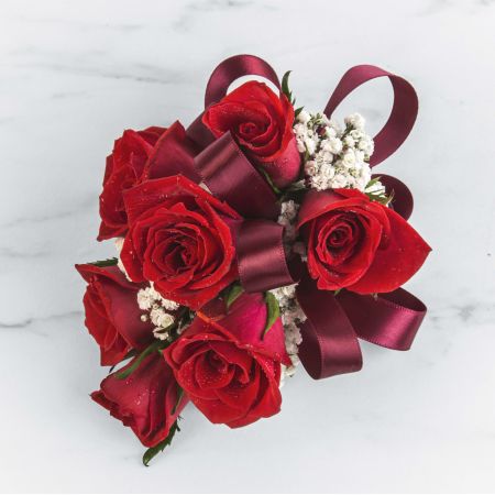 Morningside Florist Rancho Cordova - A classic red rose and baby's breath corsage compliments any outfit. Perfect for prom, formal, and weddings. Please inquire about other color options.Leave note on order or call to specify ribbon color.
Unavailable for Delivery.