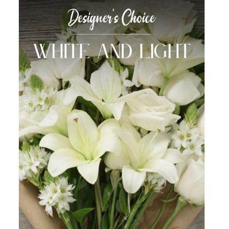 Morningside Florist Rancho Cordova - Embrace the delicate beauty with our Designer's Choice White and light arrangement. Each bouquet is a unique creation, thoughtfully curated by our expert florists using the freshest, hand-selected flowers of the season.  Perfect for any occasion, from birthdays to anniversaries, or simply to brighten someone\u2019s day, this arrangement captures the essence of serene beauty. The pastel petals will bring a touch of gentle sophistication to any space.  Let us surprise you with a personalized floral masterpiece that celebrates the subtle charm of pastel colors. The Designer\u2019s Choice White and light  arrangement is a lovely way to send a heartfelt message and share the joy of nature\u2019s softest blooms.