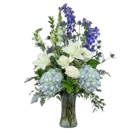 Morningside Florist Rancho Cordova - Graceful and elegant. Blue Beauty is perfect way to express sophistication to any gathering. Hydrangea, lilies, and roses are highlighted in our gathering vase.