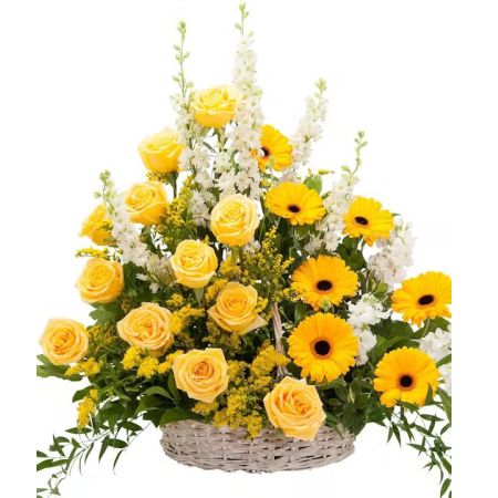 Morningside Florist Rancho Cordova - A white wicker basket filled with a beautiful selection of yellow flowers and foliage.