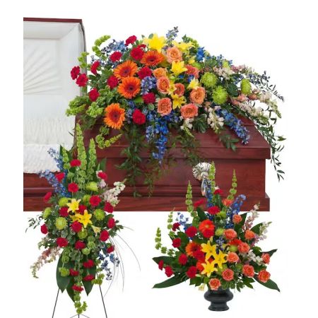 Morningside Florist Rancho Cordova - The treasured celebration trio includes a casket spray, standing easel spray and crescent urn arrangement.