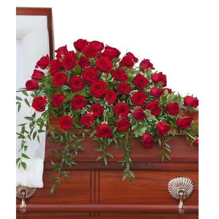 Morningside Florist Rancho Cordova - An abundance of Red roses with premium foliage in a casket spray.