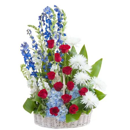 Morningside Florist Rancho Cordova - A basket filled with an honorable display of red, white, and blue flowers.