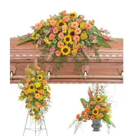Morningside Florist Rancho Cordova - Includes a casket spray, standing spray and urn design in the beautiful colors of a sunset.