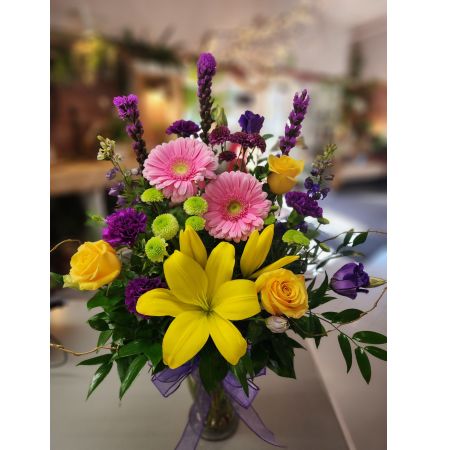 Morningside Florist Rancho Cordova - Spring sunshine feels like a soft, golden embrace\u2014warm but not overwhelming, gentle yet full of life. There's a freshness in its glow, a crisp brightness that lifts the world up, making everything feel renewed. Lovely lavenders /Purples embrace the vibrant yellows and soft pinks making this an amazing gift for any mom, grandma, friend or Wife.