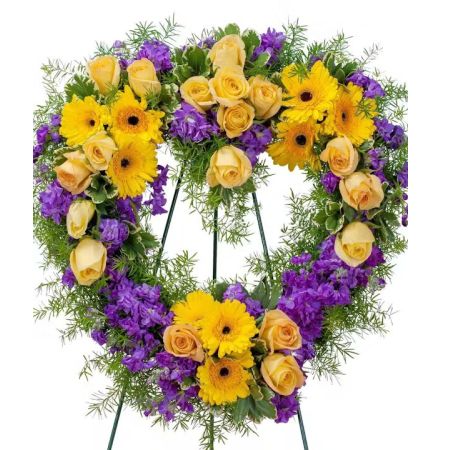 Morningside Florist Rancho Cordova - Bright yellow and purple flowers create this heart shape of vivid memories.