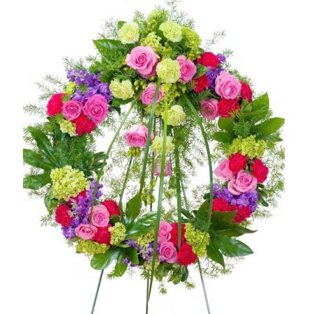 Morningside Florist Rancho Cordova - This beautiful wreath with a combination of pink and purple flowers will show that they will be forever cherished.