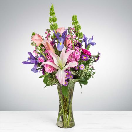 Morningside Florist Rancho Cordova - This arrangement contains stargazer lilies, bells of ireland, stock, blue iris, roses, carnations, and purple aster. This is a great gift for birthday, Mother's Day, love and romance, or to say thank you. APPROXIMATE DIMENSIONS: 16\