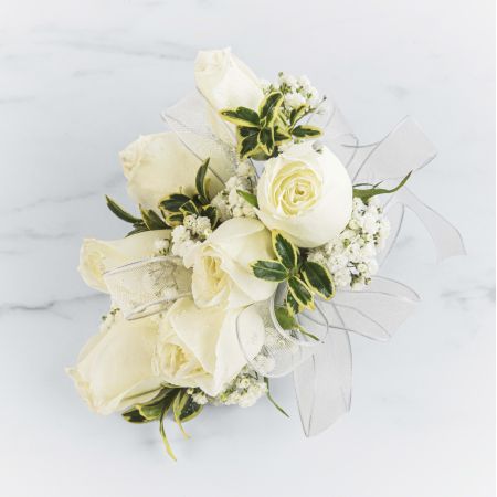 Morningside Florist Rancho Cordova - A classic white corsage with sheer ribbon, this wrist arrangement looks good with any outfit. A perfect complement to any prom, formal, or wedding event. Please inquire about other color options.Leave note on order or call to specify ribbon color.
Unavailable for Delivery.

