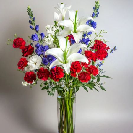 Morningside Florist Rancho Cordova - Classic and proud, this fresh arrangement brings the spirit of July 4th to life with rich color and elegant blooms.