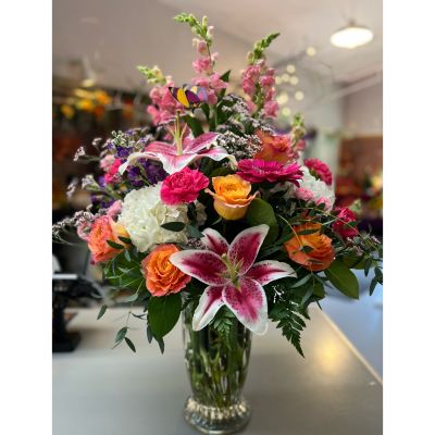 Morningside Florist Rancho Cordova - This gorgeous, lavish and bright arrangement is quite the showstopper with its bright orange and pinks. It’s going to have someone say wow!