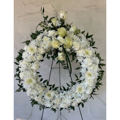 Morningside Florist Rancho Cordova - Combination of cream and white blooms in this wreath make this perfect for a lovely setting 