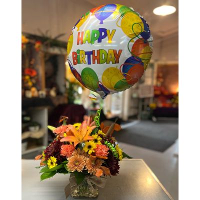 Morningside Florist Rancho Cordova - This beautiful rich  colorful autumn arrangement is perfect for any occasion, including birthdays. Specify occasion, and we will include a mylar balloon to complete the look.