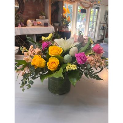Morningside Florist Rancho Cordova - A joyful celebration of spring’s tender beauty, Spring Whimsy dances with golden roses, ruffled pink carnations, and tulips kissed with morning dew. Nestled among a lovely lily and speckled eggs, each bloom whispers of garden parties and Easter mornings. Wrapped in fresh greenery and playful textures, this centerpiece brings a touch of enchantment to any table