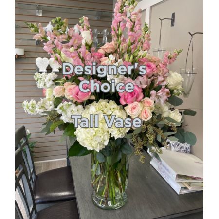 Blooms of Wayne Wayne - Seasonal flowers in tall glass vase