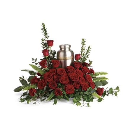 Blooms of Wayne Wayne - Express your deepest sympathy and enduring love with ‘Forever In Our Hearts’, a comforting tribute of lush, velvety red roses. 
Arranged around a beautiful silver keepsake urn, this stunning <b>sympathy arrangement</b> offers a serene expression of remembrance.
Deep green foliage and delicate ferns create a peaceful backdrop, evoking feelings of tranquility and respect.
Send this <b>funeral flower</b> arrangement to honor a loved one’s life and keep their memory alive in the hearts of all who knew them.