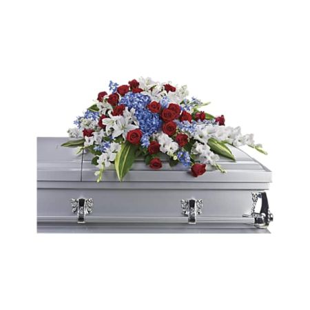 Blooms of Wayne Wayne - Honor a life well-lived with 'Distinguished Service', a breathtaking tribute of patriotic beauty.
Deep reds, brilliant whites, and calming blues cascade in a stunning display of roses, lilies, and delicate accents.
This elegant "sympathy casket spray" conveys respect, admiration, and heartfelt condolences with grace and dignity. 
Send a powerful message of remembrance and support during a difficult time with this majestic funeral flower arrangement.