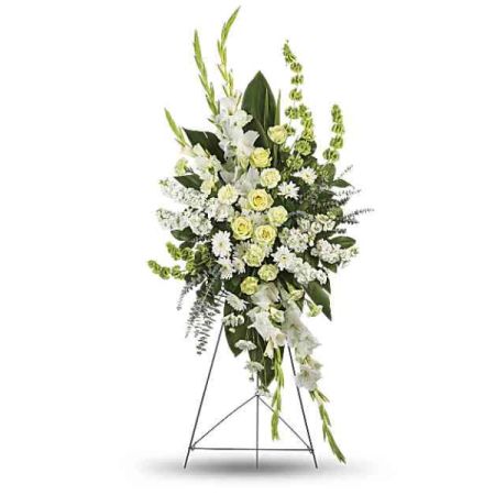 Blooms of Wayne Wayne - Embrace serenity and renewal with 'Magnificent Life', a stunning spray of white lilies, roses, and stock.
Delicate textures and soft hues evoke a sense of peace, making it a beautiful tribute or gesture of heartfelt sympathy.
This elegant standing arrangement is designed to offer comfort and express your deepest condolences with grace. 
Send a lasting symbol of hope and remembrance with this exquisite funeral flower arrangement, a beacon of light during difficult times.