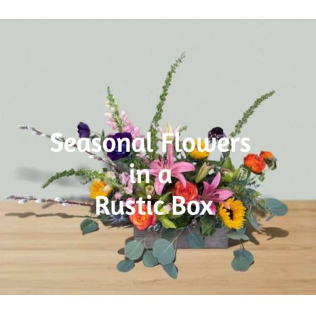 Blooms of Wayne Wayne - Let our expert florists create a stunning, one-of-a-kind flower arrangement bursting with the freshest seasonal blooms.
Presented in a charming rustic wooden box, this Designer's Choice bouquet is a delightful mix of color and texture, evoking the beauty of the moment. 
Perfect for brightening a home, celebrating a special occasion, or simply sending a heartfelt “thinking of you,” each arrangement is unique.
Experience the joy of fresh flowers delivered – a truly memorable gift that speaks volumes. Images used for illustration purposes only. Colors and flowers will vary.