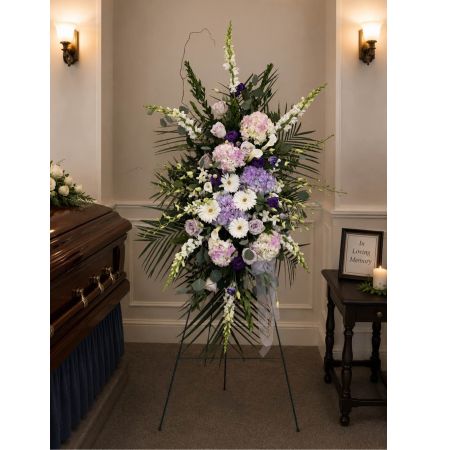 Blooms of Wayne Wayne - Drift into tranquility with our 'Loving Lavender Spray' a beautiful expression of peace and affection. This stunning arrangement captures the soothing essence of lavender blending its delicate fragrance with the airy beauty of stock and the subtle charm of eucalyptus. The soft hues evoke feelings of serenity and devotion making it a perfect tribute. Allow the gentle embrace of lavender to convey your deepest sentiments with a timeless elegance.