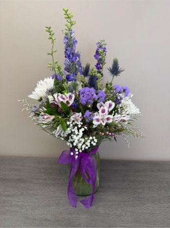 Blooms of Wayne Wayne - Immerse yourself in the boundless beauty of 'Field of Dreams'. This exquisite arrangement evokes the carefree joy of a summer meadow bursting with color and fragrance. A riot of blooms cascades in a natural relaxed style perfect for bringing the outdoors in. Imagine the gentle perfume filling a room the soft textures inviting a touch and the vibrant hues lifting spirits. Whether you’re brightening your own home or sending a thoughtful gift to someone special 'Field of Dreams' is a celebration of life's simple pleasures – a moment of peace a burst of happiness a reminder of nature's artistry. This stunning bouquet makes a beautiful centerpiece for any occasion expressing sympathy gratitude or simply 'thinking of you'.