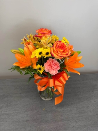 Blooms of Wayne Wayne - Embrace the warmth and subtle beauty of the changing season with 'Fall is Coming!' This stunning bouquet captures the essence of autumn bringing a touch of the outdoors in. This arrangement is perfect for welcoming fall into your own home, expressing gratitude or as a thoughtful gift to brighten someone’s day during cooler months. Each stem is carefully selected for its vibrancy and freshness ensuring a long-lasting display of natural elegance. Let ‘Fall is Coming!’ be a reminder of cozy moments and the beauty of transformation. 