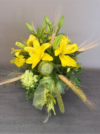 Blooms of Wayne Wayne - Brighten someone’s day – or your own! – with 'Cheer Up!' a vibrant burst of sunshine delivered in a beautiful bouquet. Imagine the sweet fragrance filling a room, the joyful colors instantly lifting spirits. This arrangement is a thoughtful expression of care perfect for sending a little happiness when words aren't enough. 'Cheer Up!' is designed to evoke a feeling of warmth and optimism making it an ideal gift for birthdays get-well wishes or simply to show someone you’re thinking of them. The delicate petals and lush greenery create a captivating display that promises a moment of pure delight. Let 'Cheer Up!' be a beacon of positivity in any space.