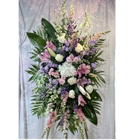 Log Cabin Florist Bakersfield - A Beautiful Tribute Filled With A Large Assortment Of Stock,Hydrangea, Roses And Lilies.