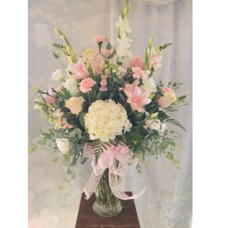 Log Cabin Florist Bakersfield - Echoing The Exuberance Found Throughout The Season This Beautiful Bouquet Is Perfect As A Funeral Tribute To The Home.**Flowers may vary depending upon availability**