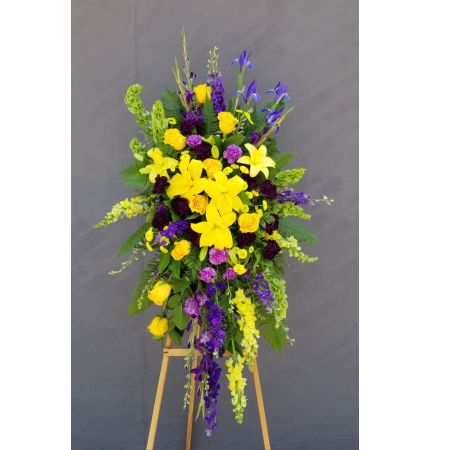 Log Cabin Florist Bakersfield - Yellow Lavender And Blue In A Classic Easel Spray.
