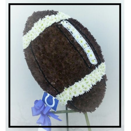 Log Cabin Florist Bakersfield - A large floral football that will be personalized with your loved ones favorite team colors and script. Price is for basic football as pictured. Additional custom script prices vary.