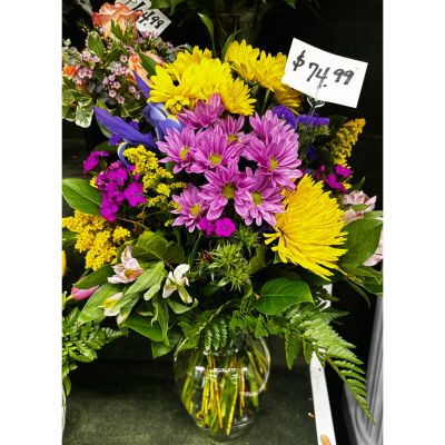 DiBella Flowers & Gifts Las Vegas - Bright mix of yellow, blue and lavender flowers