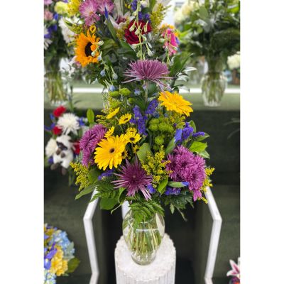 DiBella Flowers & Gifts Las Vegas - Purple and Yellow Arrangement IN THE COOLER 
