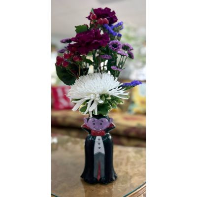 DiBella Flowers & Gifts Las Vegas - Brighten someone's day with our Bloom Sucker Arrangement in the Cooler, a delightful mix of fresh, seasonal blooms arranged in a charming vase. This arrangement is perfect for spontaneous gifting or adding a touch of color to any space. Available for same-day pickup at our Las Vegas location.
