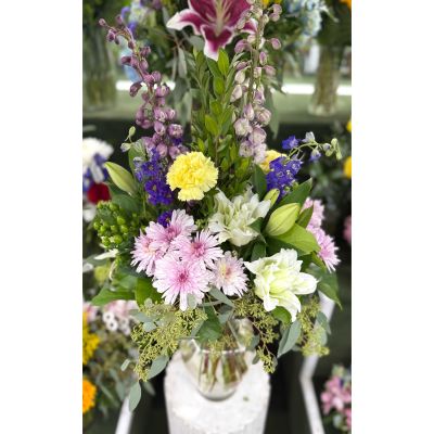 DiBella Flowers & Gifts Las Vegas - LAVENDER LIGHT ARRANGEMENT IN THE COOLER
