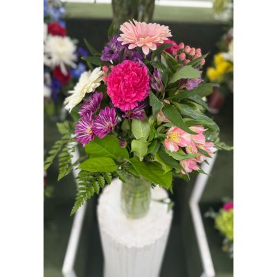 DiBella Flowers & Gifts Las Vegas - PINK PETALS ARRANGEMENT IN THE COOLER