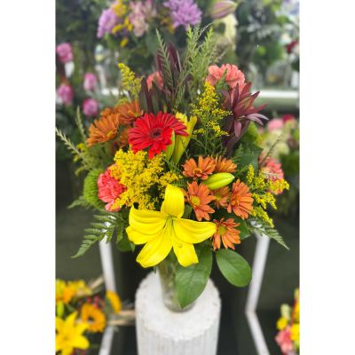 DiBella Flowers & Gifts Las Vegas - Autumn Sunrise Arrangement In the Cooler