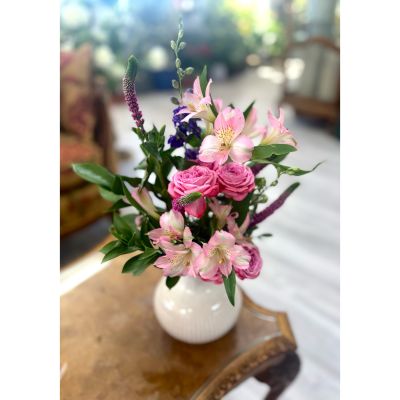 DiBella Flowers & Gifts Las Vegas - Brighten any space with this charming mix of fresh blooms in soft pink tones. Featuring delicate alstroemeria, vibrant roses, and lush greenery, this arrangement brings a touch of grace and cheer to every occasion. Designed in a classic white vase, it’s perfect for birthdays, get-well wishes, or simply adding beauty to the home.