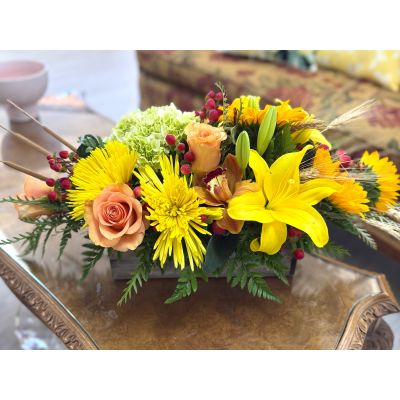 DiBella Flowers & Gifts Las Vegas - Bring the harvest home with this cheerful Thanksgiving arrangement, overflowing with seasonal blooms and rustic charm.