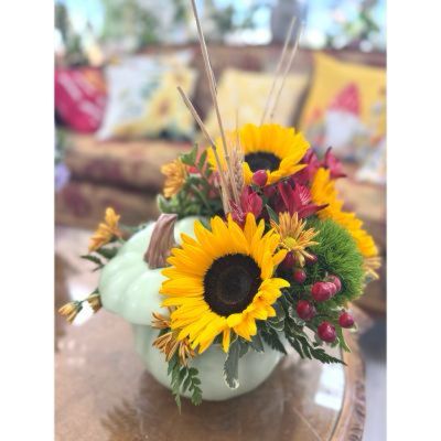 DiBella Flowers & Gifts Las Vegas - A modern twist on fall florals! Designed in a chic green pumpkin vase, this bouquet features seasonal blooms that blend elegance with festive flair. Perfect as a Homecoming gift, a stylish centerpiece, or a thoughtful autumn surprise.