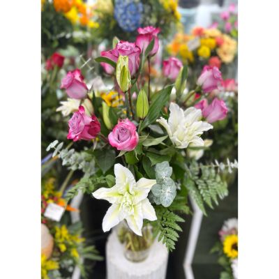 DiBella Flowers & Gifts Las Vegas - Dozen Lavender Roses and White Lillies In the Cooler