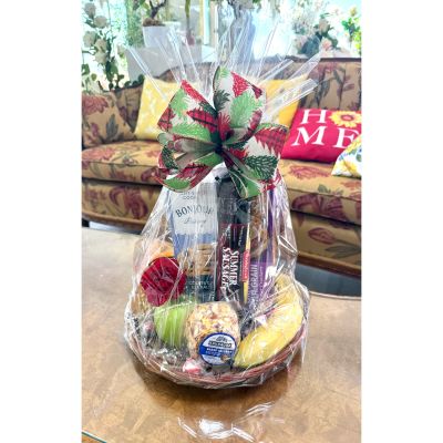 DiBella Flowers & Gifts Las Vegas - A delightful mix of fresh, juicy fruit paired with an irresistible assortment of sweet and savory treats, this fruit and goodie basket is the perfect way to brighten anyone’s day. Thoughtfully arranged and bursting with flavor, it’s a feel-good gift that’s great for celebrations, thank-yous, get-well wishes, or just because. 
Includes seasonal fruits, cheese, sausage, crackers and cookies.