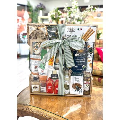 DiBella Flowers & Gifts Las Vegas - This thoughtfully curated gourmet tray is filled with artisan crackers, savory spreads, olives, nuts, and sweet treats, all beautifully arranged and finished with a classic ribbon—perfect for sharing, celebrating, and savoring every bite. 