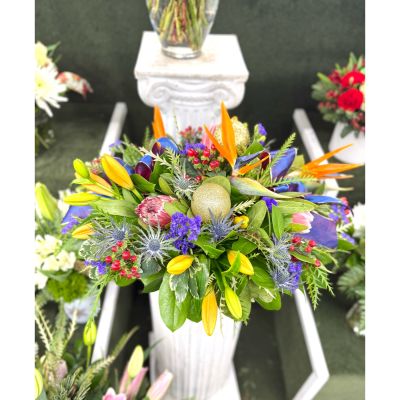 DiBella Flowers & Gifts Las Vegas - Charming Tropical Centerpiece In the Cooler