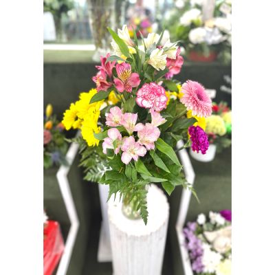 DiBella Flowers & Gifts Las Vegas - Cheerful Charm Arrangement In The Cooler