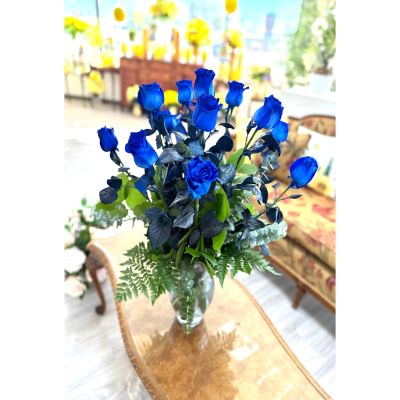 DiBella Flowers & Gifts Las Vegas - A striking dozen royal blue roses, beautifully arranged to make a bold and unforgettable statement. Their rich, velvety color symbolizes mystery, depth, and a love that dares to be different. Perfect for Valentine’s Day or any special moment when you want to express admiration and romance with a touch of dramatic charm 
